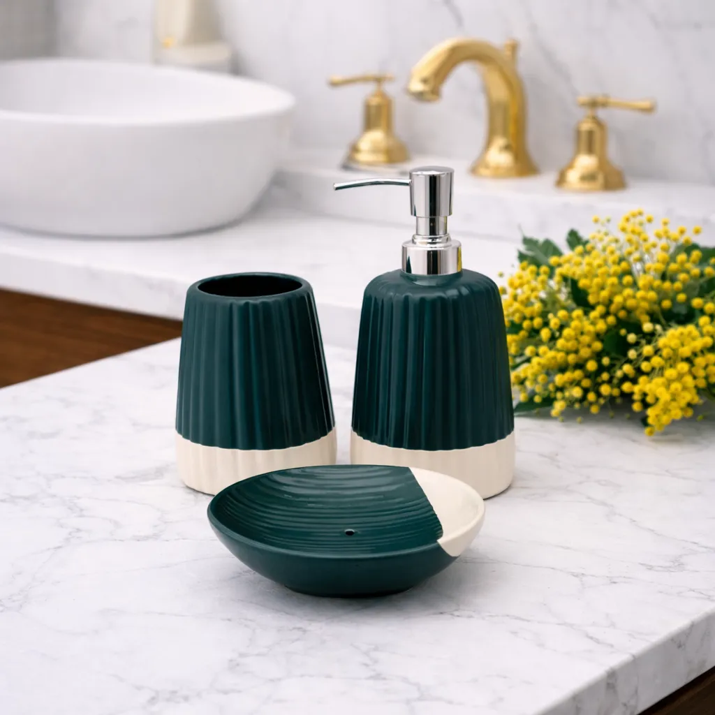 Teal bathroom accessories on marble countertop.webp
